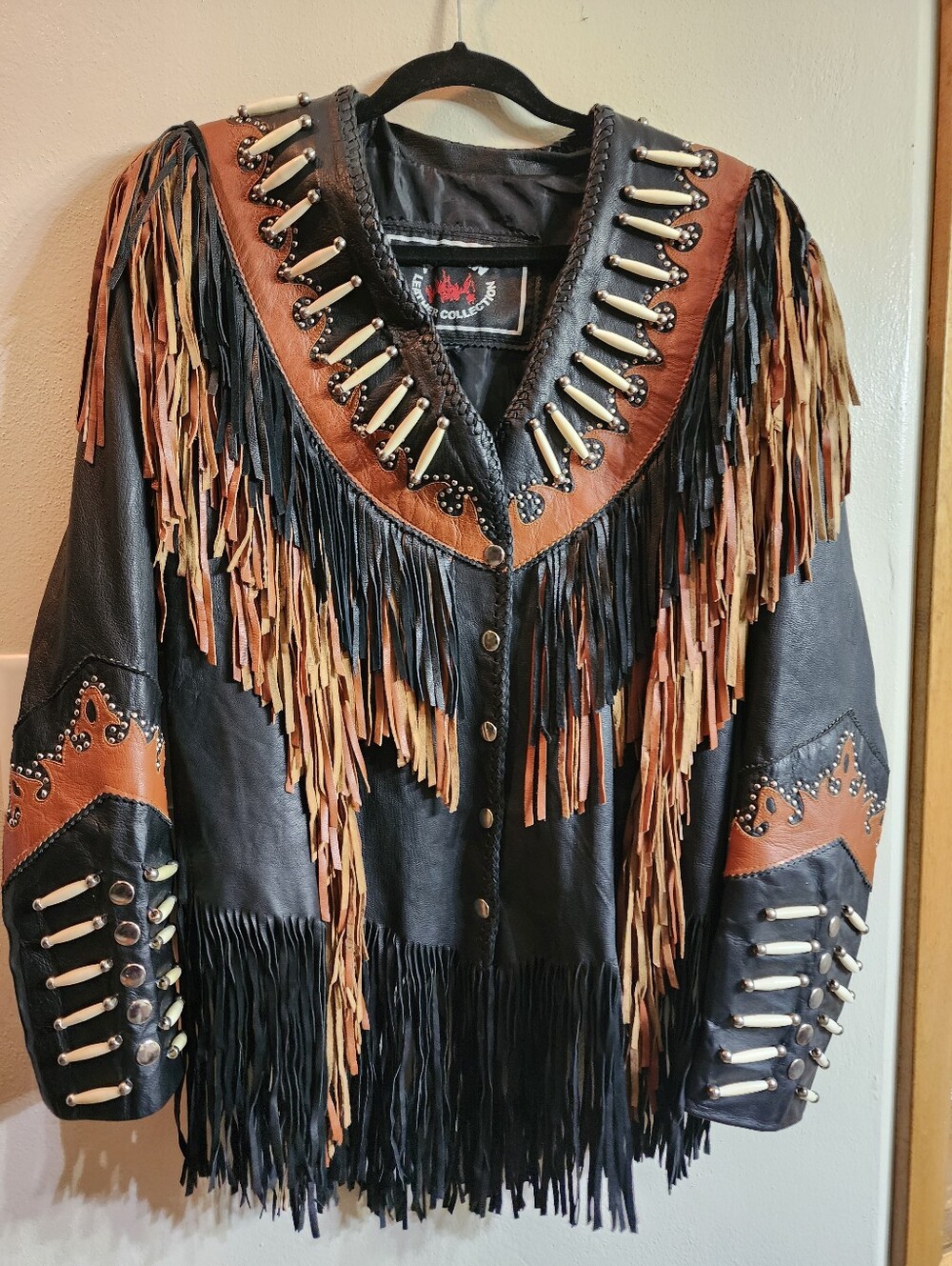 Fringed Leather Jacket with Studded Bone Accents - Black & Brown